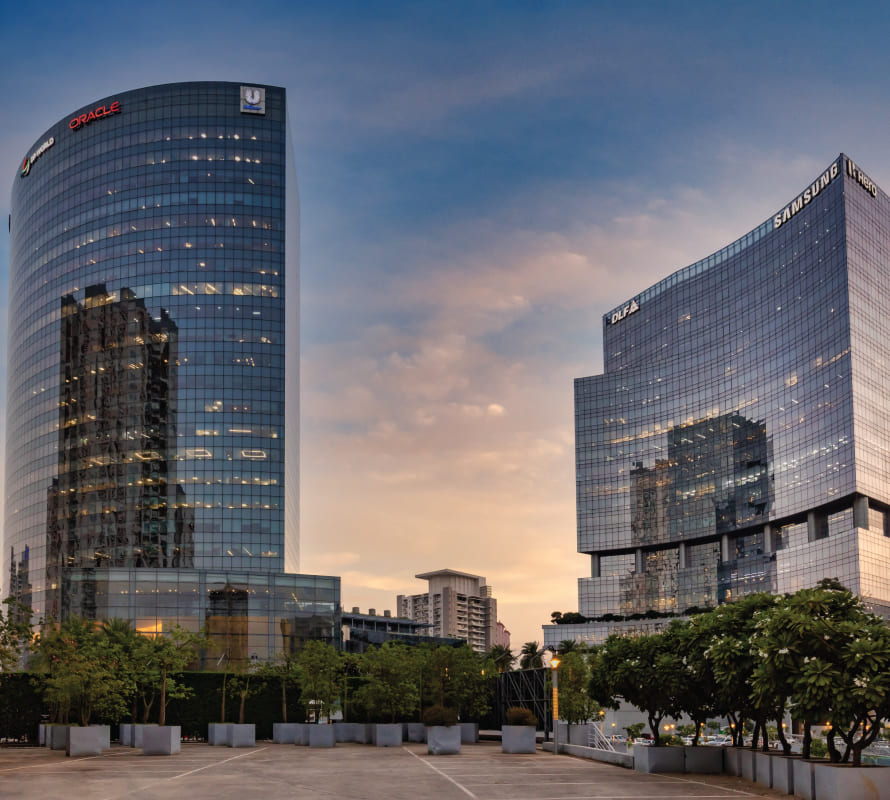 One Horizon Center (left) and Two Horizon Center at dusk, Golf Course Road, Gurugram