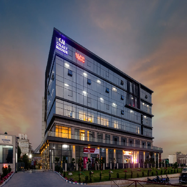 Dusk exterior view showing building signage