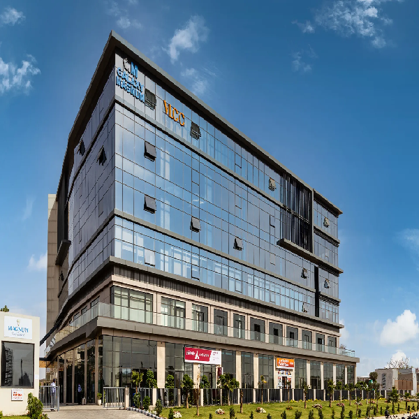 Angled exterior view of the glass facade