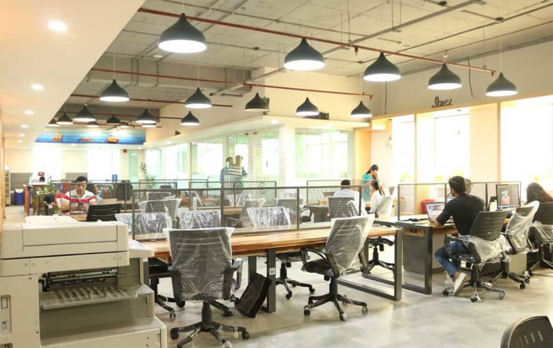 Furnished workstation area in a Udyog Vihar Phase 4 office building