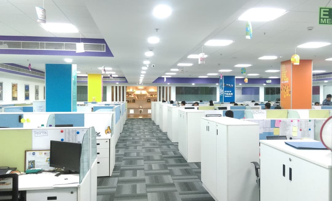 Furnished open-plan office interior in a Sector 32 commercial building