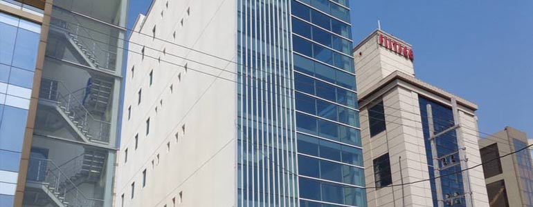 BPTP Park Centra street-facing view amid neighbouring towers