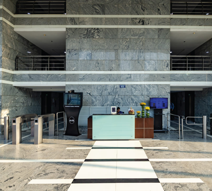 Lobby reception area with access-control turnstiles